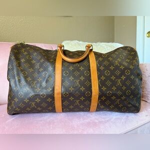 Louis Vuitton Authentic Souple Bandouliere 55 Keepall Monogram Duffel Bag.